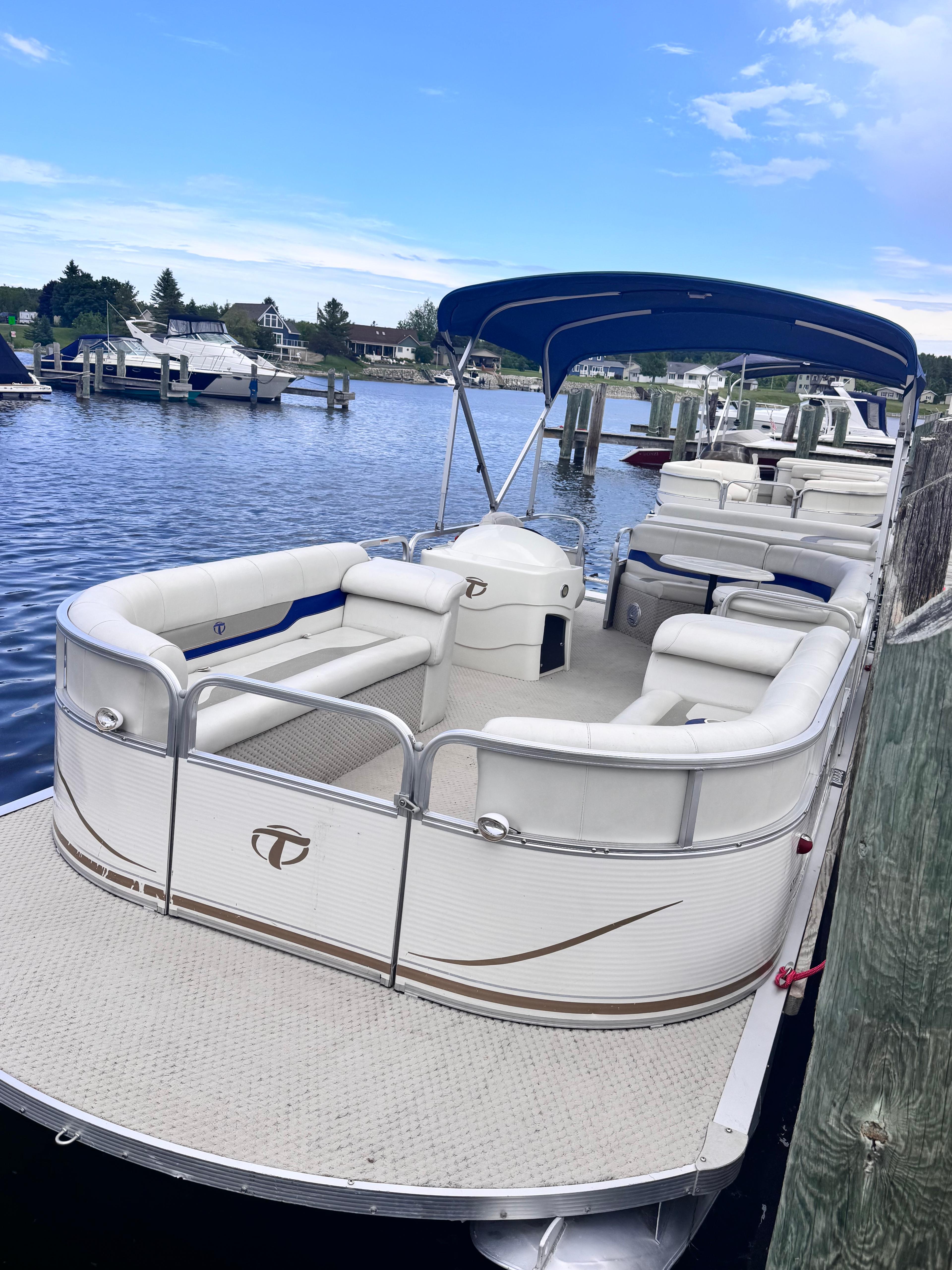 Pontoon boat on Cheboygan River